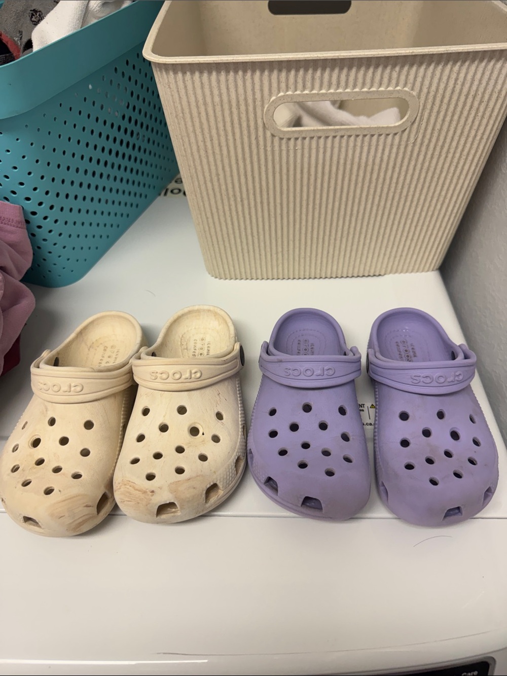 2 CROCS Kids' Classic Clogs in Cream and Lavender